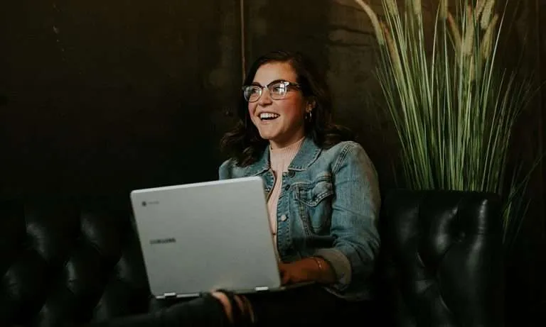 Marketer planning privacy-first digital advertising strategy on laptop